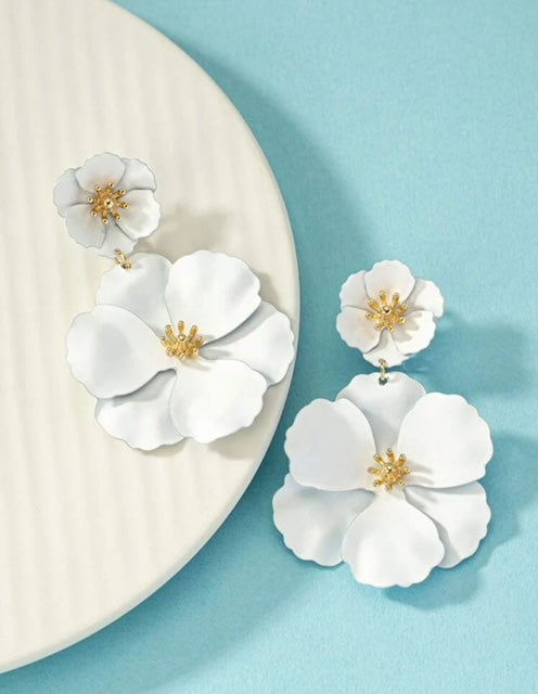 Oorbellen clips. Wit flower