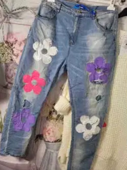 Jeans met geborduurde flowers